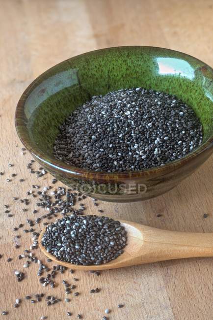 Chia seeds in green bowl — Stock Photo