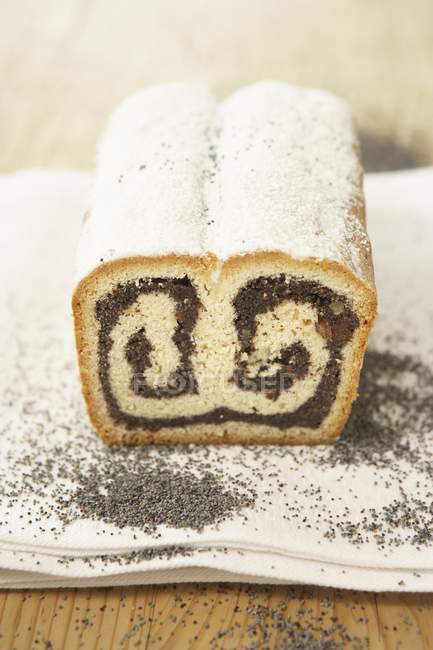 Poppyseed stollen with icing sugar — Stock Photo