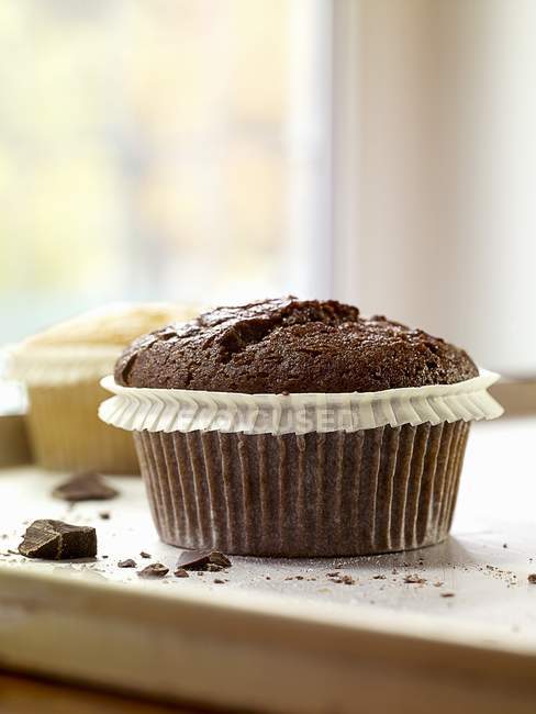 Muffins na frente da janela — Fotografia de Stock