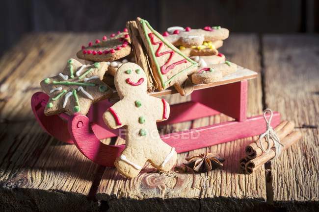 Gingerbread biscuits on sleigh — Stock Photo