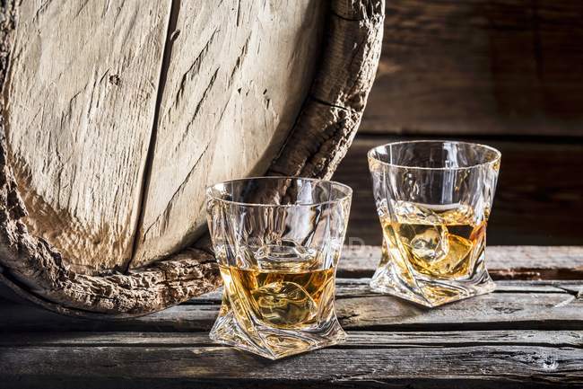 Glasses of whiskey on the rocks — Stock Photo