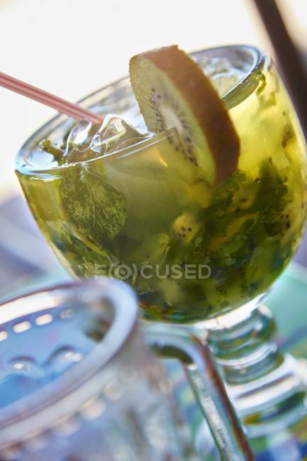 Mojito cocktail in glass with straw — Stock Photo
