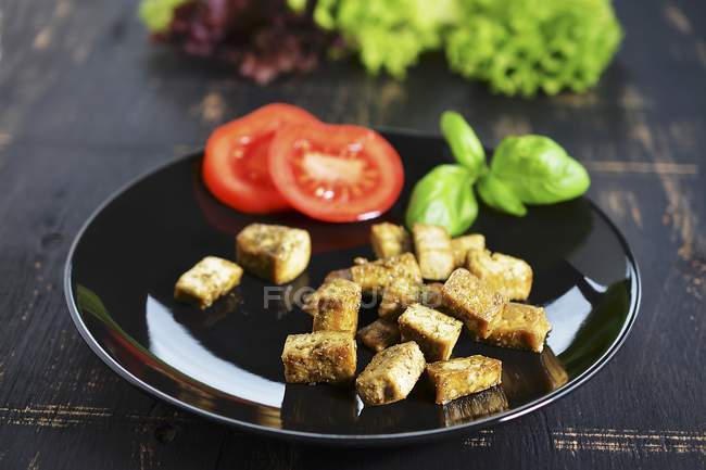 Diced tofu fried with herbs — Stock Photo