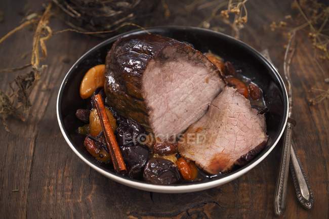 Roasted beef with fruits — Stock Photo