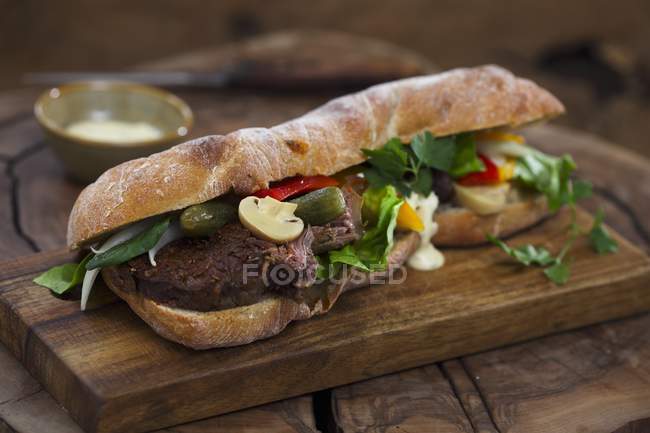 Baguette sandwich with beef — Stock Photo