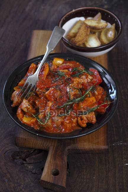Braised pork with peppers — Stock Photo