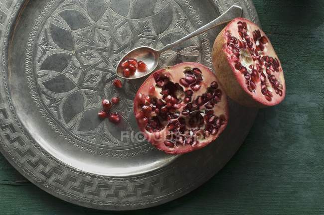 Fresh halved pomegranate — Stock Photo