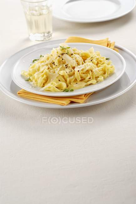 Tagliolini pasta with cheese sauce — Stock Photo