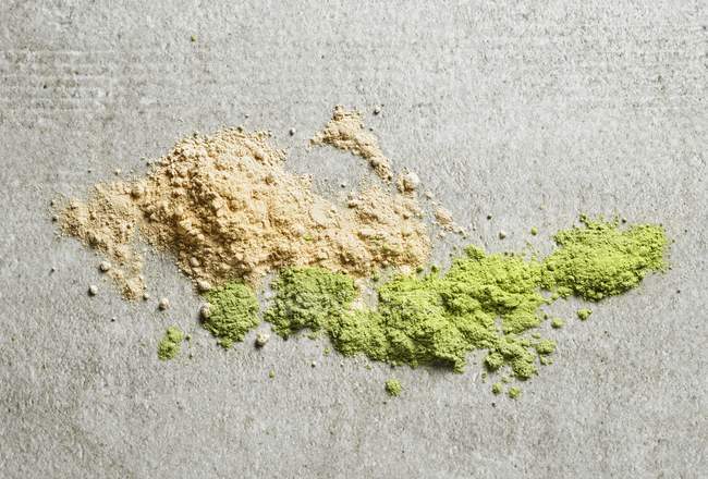 Maca powder and sprouts — Stock Photo