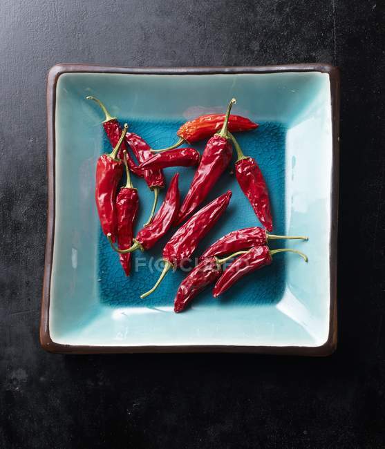 Dried red chilli peppers — Stock Photo