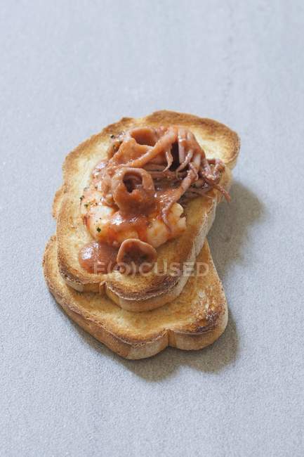 Grilled bread with seafood — Stock Photo