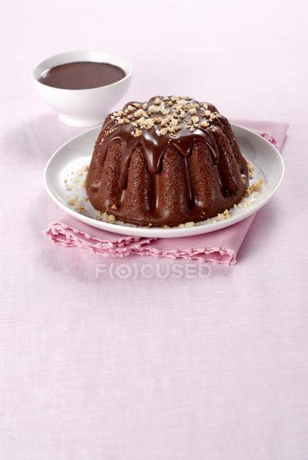 Chocolate pudding with chocolate sauce — Stock Photo
