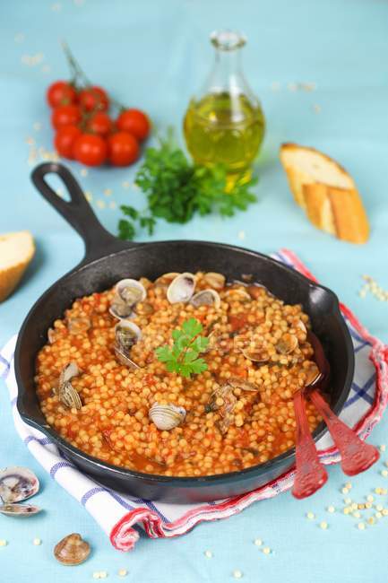 Fregola pasta with mussels — Stock Photo