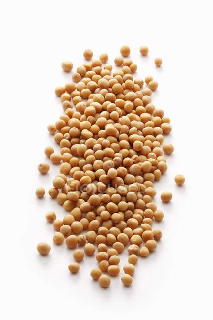 Mustard seeds in heap — Stock Photo