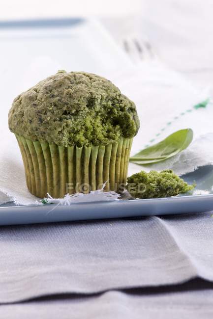 Spinach muffin on plate — Stock Photo