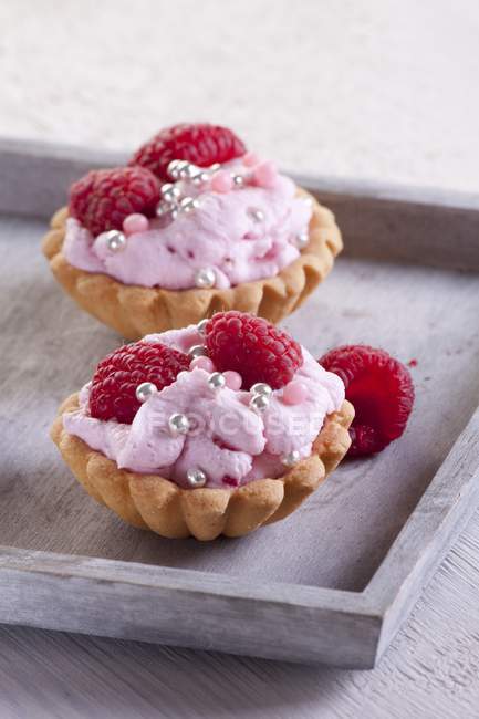 Cupcakes with raspberry mousse — Stock Photo