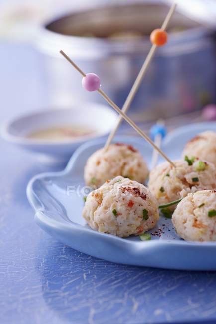 Closeup view of prawn and ginger balls with skewers — Stock Photo