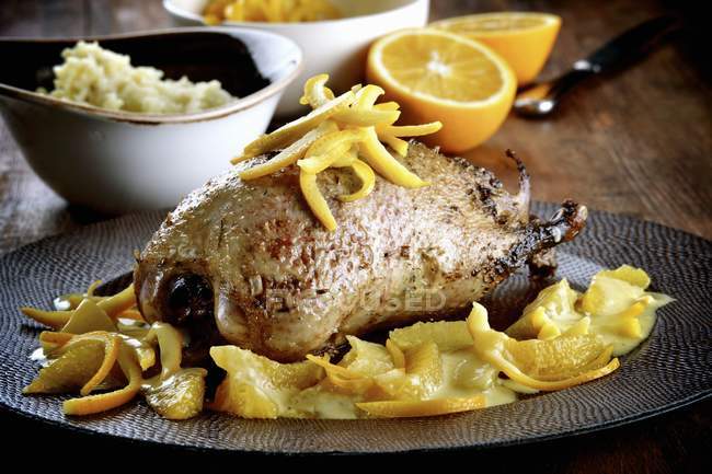 Roasted whole Duck with oranges — Stock Photo