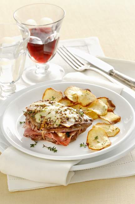 Leaflet with ham and cheese — Stock Photo
