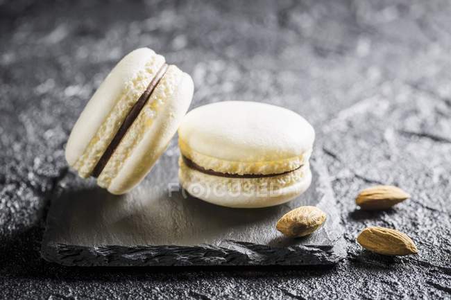 Almond macaroons on stone — Stock Photo