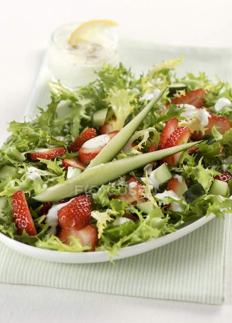 Frisee Lettuce With Strawberries On White Plate Over Towel Snack Ingredients Stock Photo