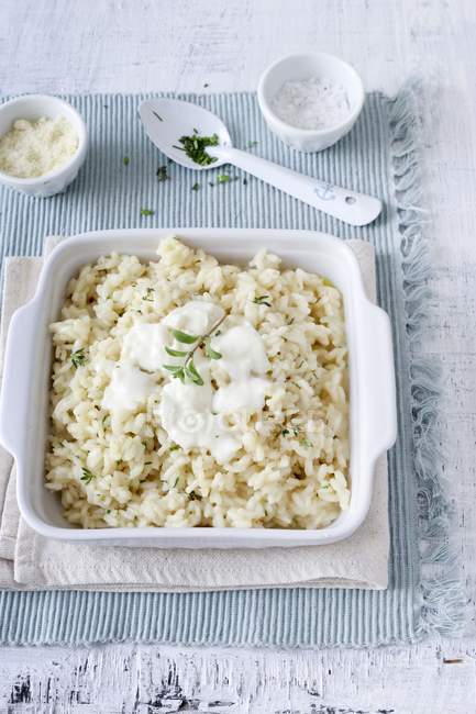 Cheese and herb risotto — Stock Photo