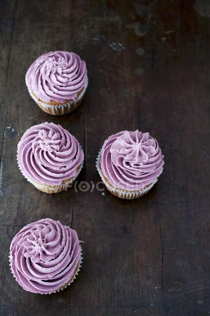 Quattro cupcake ai mirtilli — Foto stock