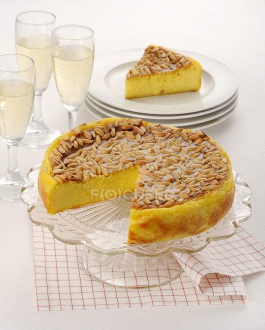 Polenta cake with pine nuts — Stock Photo