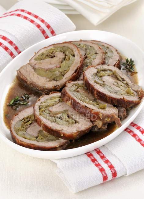 Pork roulade filled with capers — Stock Photo