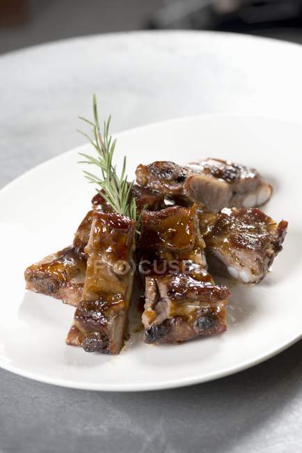 Glazed chops with rosemary — Stock Photo