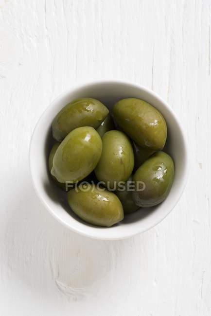 Green Bella di Cerignola olives — стокове фото
