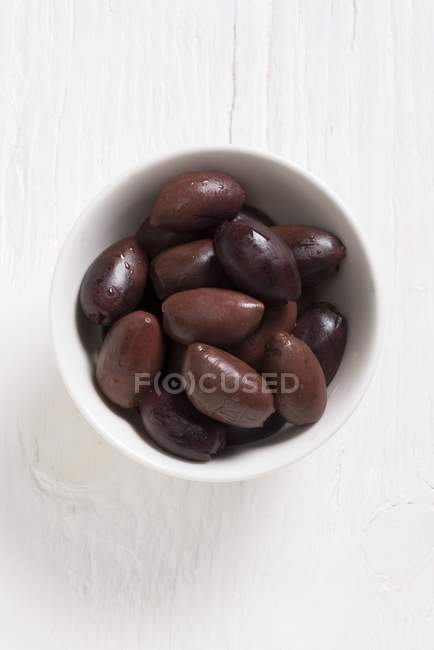 Preserved black Kalamata olives — Stock Photo