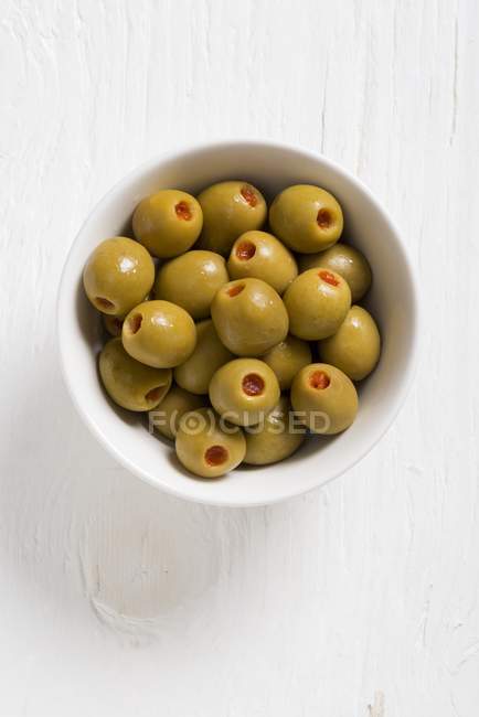 Spanish olives filled with peppers — Stock Photo