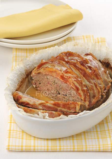 Bacon-wrapped meatloaf — Stock Photo
