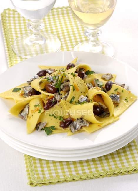 Stracci fresh pasta with anchovies — Stock Photo
