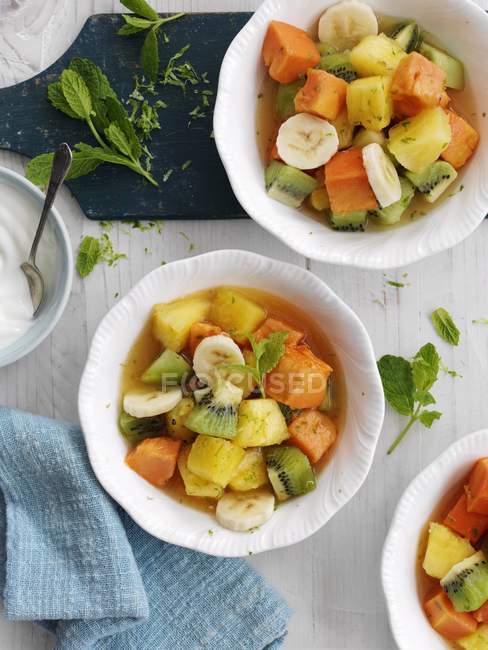 Fruit salad with pineapple — Stock Photo