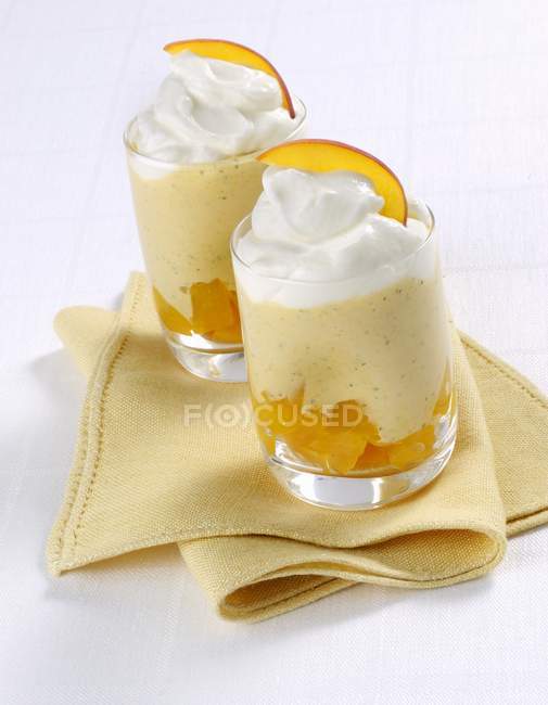Peach mousse with cream — Stock Photo