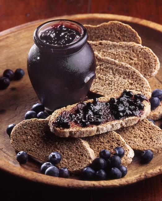 Blueberry jam on bread — Stock Photo