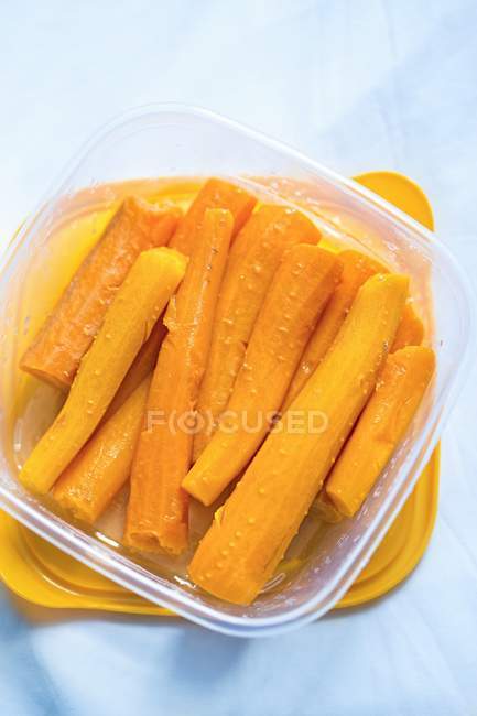Cooked carrots in box — Stock Photo