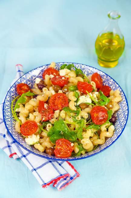 Pasta with steamed tomatoes — Stock Photo