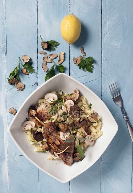 Fusili pasta salad with grilled hare — Stock Photo