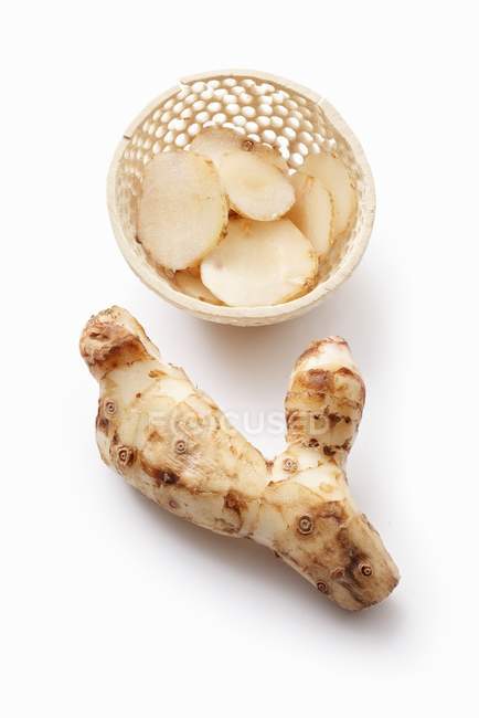Galangal root and slices — Stock Photo