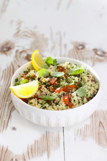 Couscous salad with tomatoes — Stock Photo