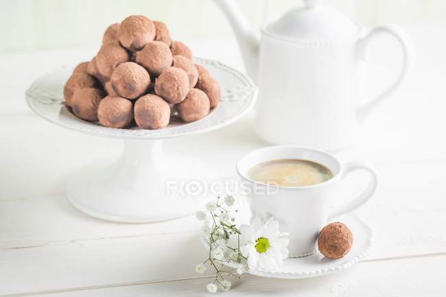 Chocolate truffles on table — Stock Photo