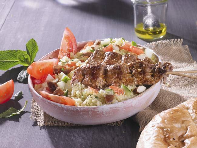 Couscous tabbouleh with meat — Stock Photo
