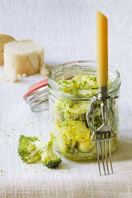 Potato salad with broccoli and pesto in jar — Stock Photo