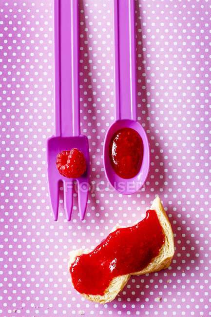 Raspberry face made with cutlery — Stock Photo