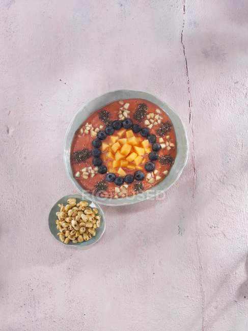 Melon and raspberry smoothie bowl — Stock Photo