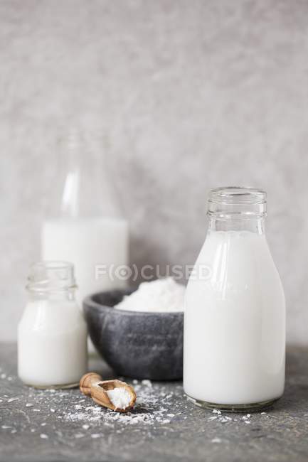 Bottles of coconut milk — Stock Photo