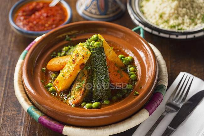 Closeup view of vegetable Tagine and couscous — Stock Photo